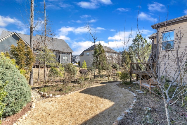 view of yard featuring a deck