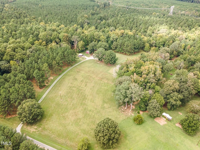 aerial view with a forest view and a rural view