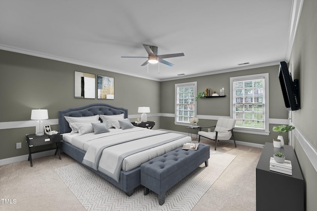 bedroom with light colored carpet, crown molding, visible vents, and baseboards