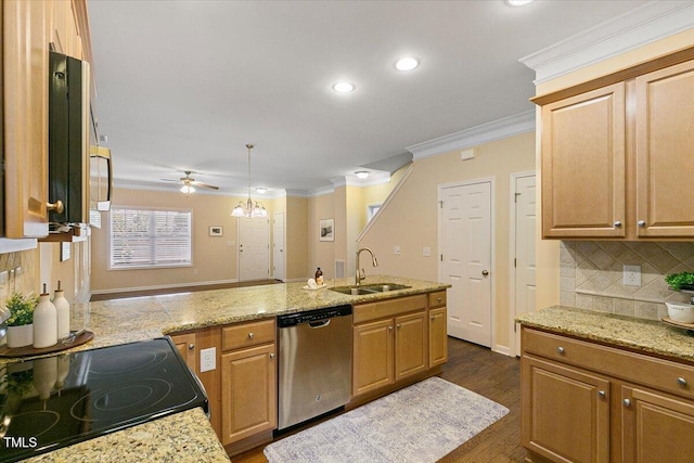 kitchen featuring a peninsula, a sink, stainless steel dishwasher, decorative light fixtures, and crown molding