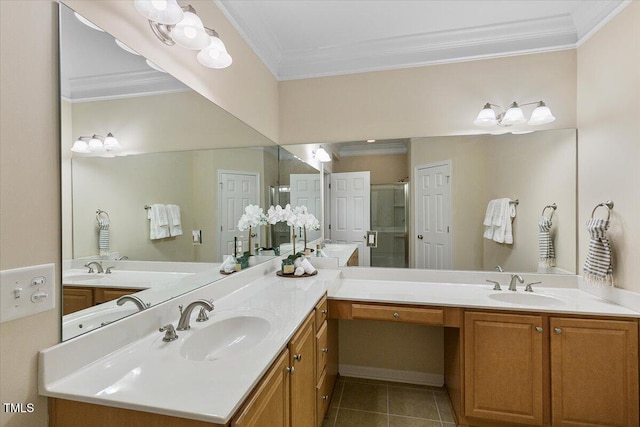 bathroom featuring ornamental molding, a stall shower, tile patterned flooring, and vanity