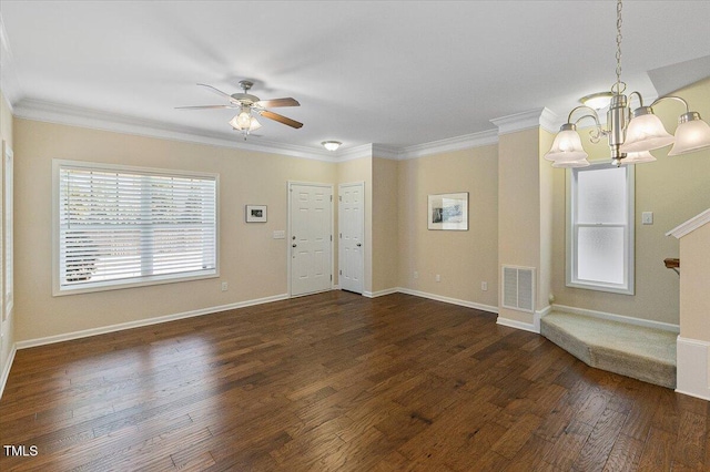 interior space featuring dark wood-style floors, ornamental molding, ceiling fan with notable chandelier, and visible vents