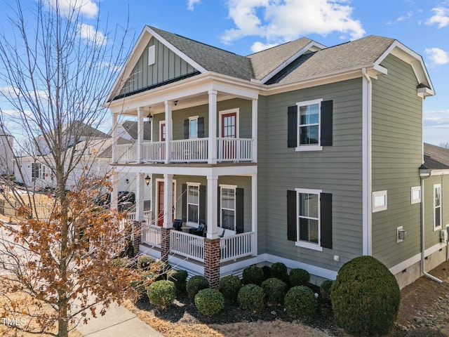 view of front of home featuring a porch, a shingled roof, a balcony, and board and batten siding