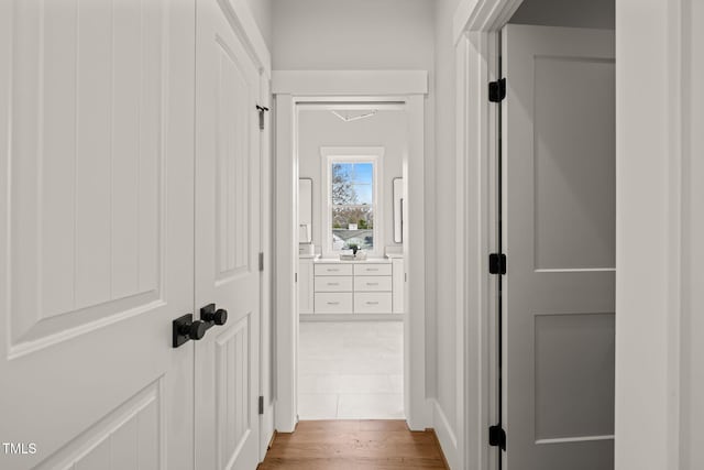 hallway featuring wood finished floors