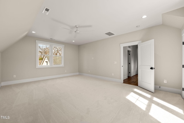 bonus room featuring visible vents, ceiling fan, baseboards, and lofted ceiling