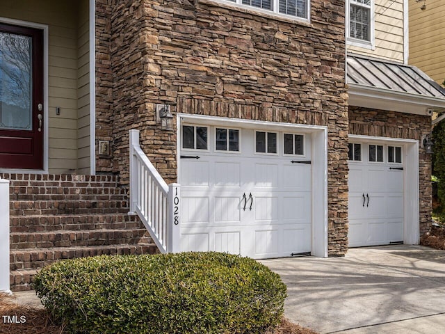 garage with driveway