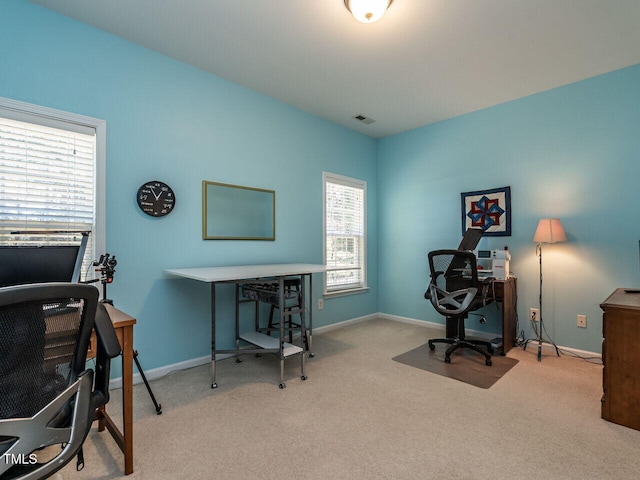 home office featuring baseboards, visible vents, and carpet flooring