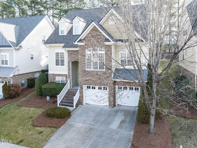 view of front of house featuring an attached garage, stone siding, a shingled roof, and concrete driveway