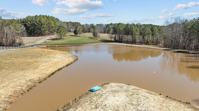 water view featuring a wooded view