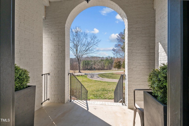 view of patio with a balcony