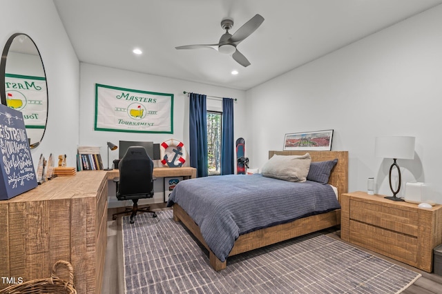 bedroom with wood finished floors, a ceiling fan, and recessed lighting