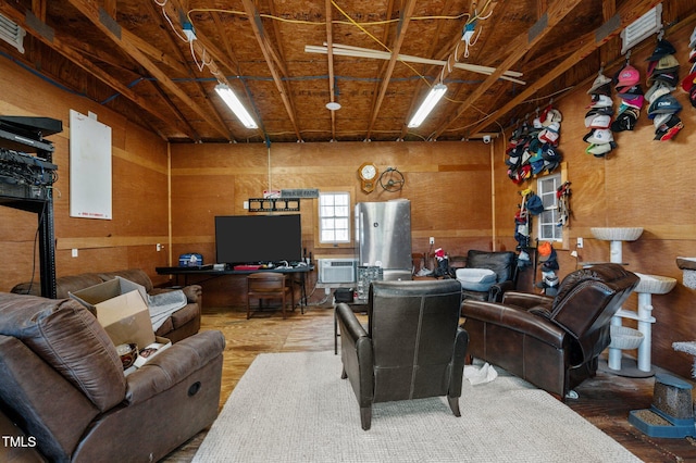 living area featuring a wall unit AC