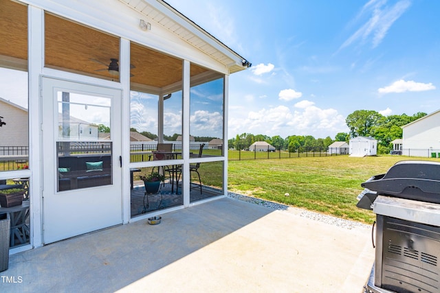 view of patio featuring grilling area and fence