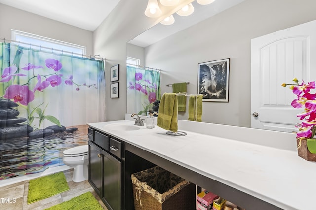 full bath featuring toilet, a shower with curtain, and vanity