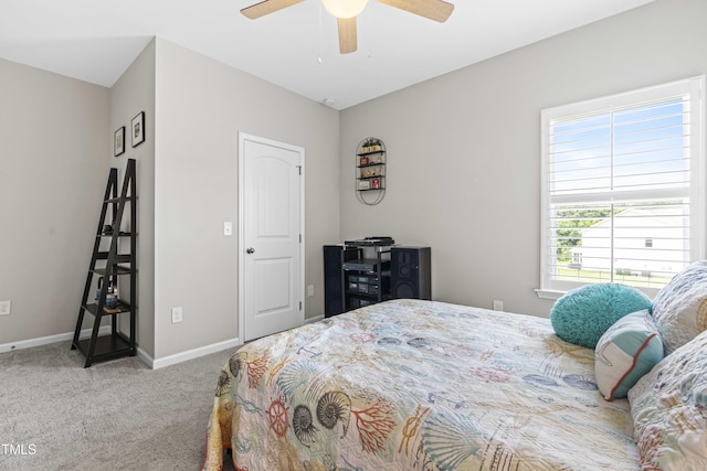 bedroom featuring carpet floors, ceiling fan, and baseboards