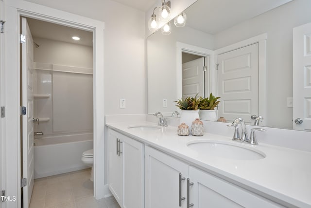 504 Yeowell Dr, Chapel Hill, NC 27514 - full bathroom featuring double vanity, tile patterned flooring, tub / shower combination, and recessed lighting