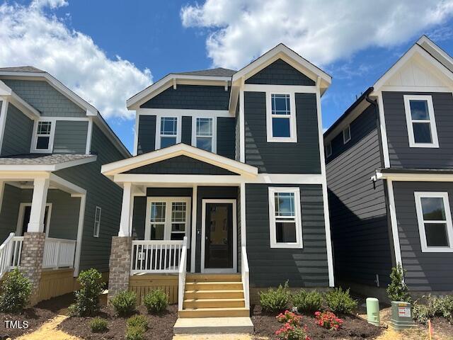 504 Yeowell Dr, Chapel Hill, NC 27514 - craftsman-style house with covered porch