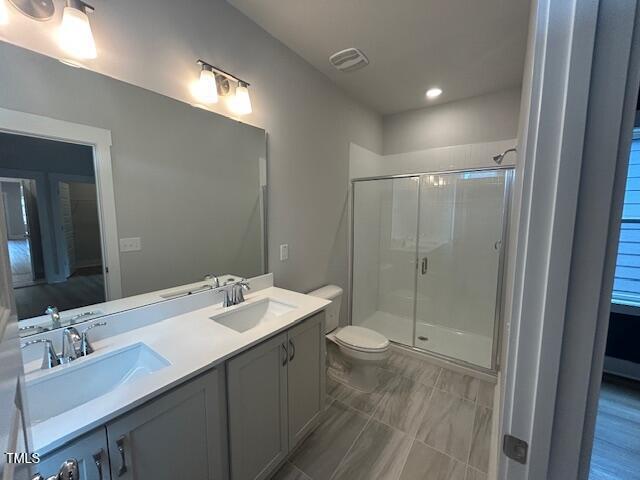 504 Yeowell Dr, Chapel Hill, NC 27514 - full bathroom with a shower stall and double vanity