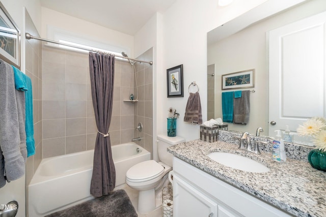 full bathroom featuring vanity, toilet, and shower / bath combo with shower curtain