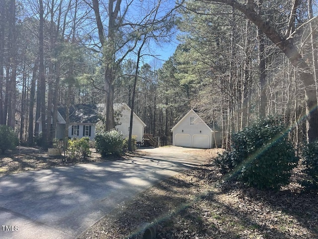 view of street featuring driveway