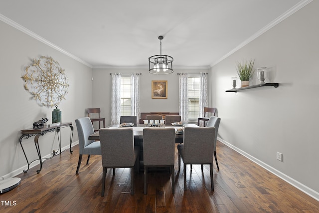 dining space with a chandelier, crown molding, baseboards, and dark wood-style flooring