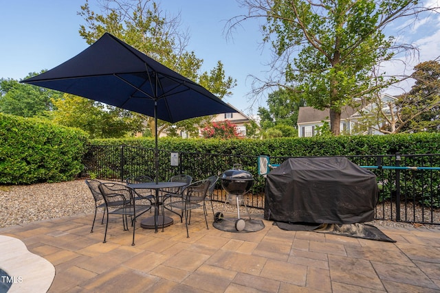 109 Skywater Ln, Holly Springs, NC 27540 - view of patio featuring a grill and outdoor dining space