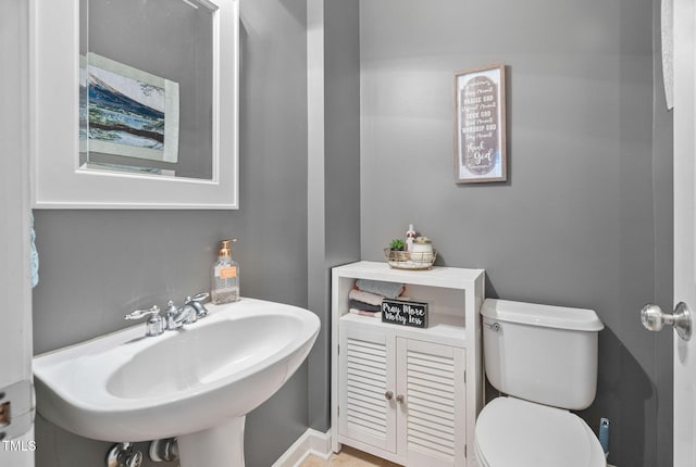 109 Skywater Ln, Holly Springs, NC 27540 - bathroom featuring toilet and a sink