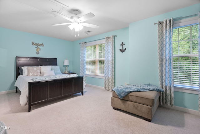 109 Skywater Ln, Holly Springs, NC 27540 - bedroom with light colored carpet, a ceiling fan, and attic access