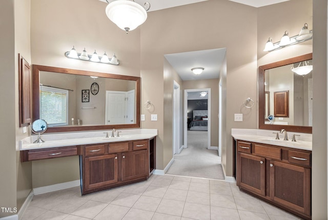109 Skywater Ln, Holly Springs, NC 27540 - full bath featuring two vanities and tile patterned floors