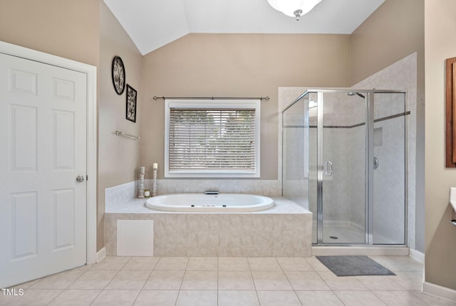 109 Skywater Ln, Holly Springs, NC 27540 - bathroom with tile patterned floors, a bath, a stall shower, and vaulted ceiling