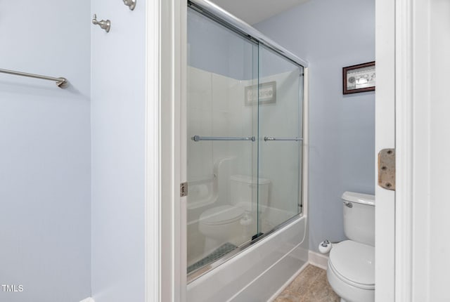 109 Skywater Ln, Holly Springs, NC 27540 - bathroom featuring toilet and shower / bath combination with glass door