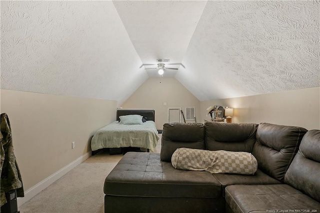 bedroom featuring lofted ceiling, light colored carpet, visible vents, ceiling fan, and baseboards