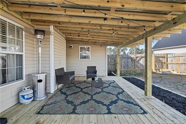 wooden deck featuring fence