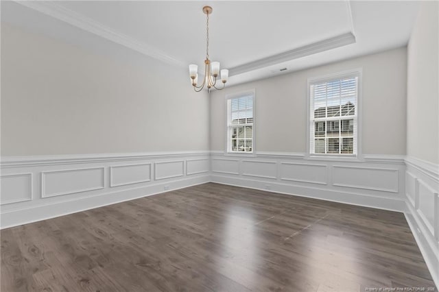 5427 Debut Ave, Hope Mills, NC 28348 - empty room with a chandelier, wainscoting, crown molding, and dark wood finished floors