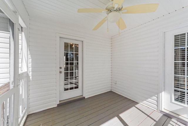 wooden terrace featuring ceiling fan