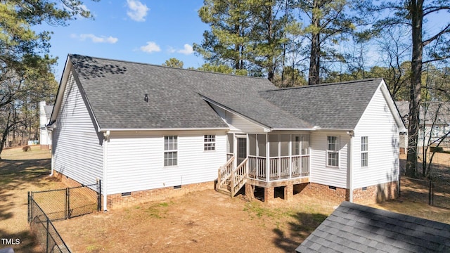 rear view of house featuring roof with shingles, crawl space, a gate, and a sunroom