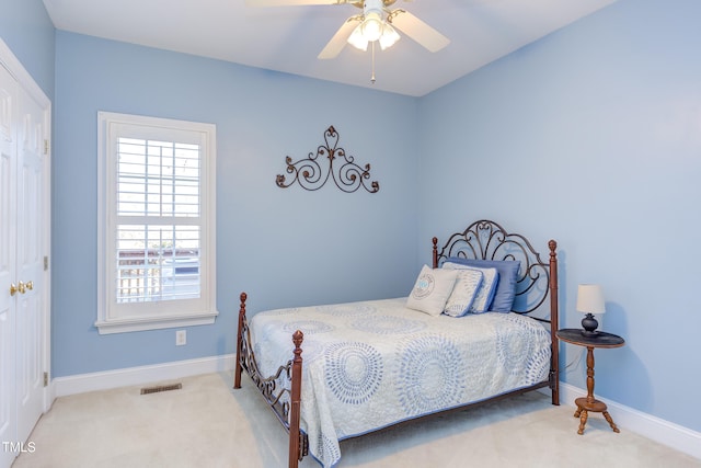 bedroom featuring visible vents, carpet floors, and baseboards