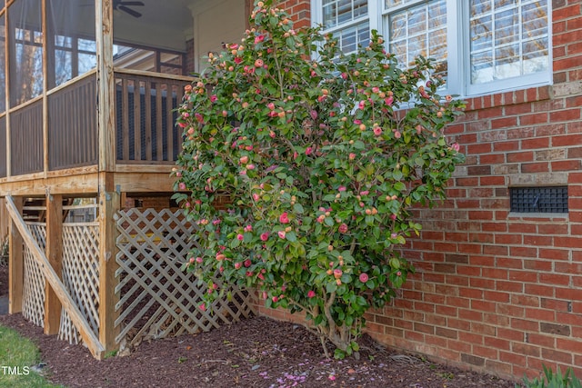 exterior space with brick siding