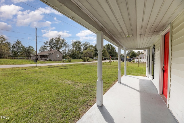 view of yard with covered porch