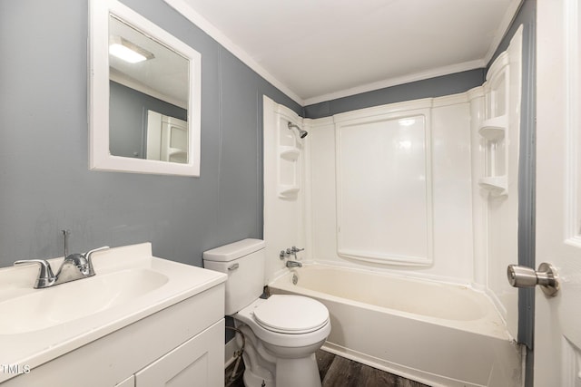 full bathroom with bathing tub / shower combination, vanity, toilet, and wood finished floors