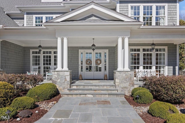 property entrance with covered porch