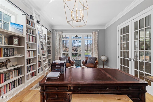 office area featuring french doors, ornamental molding, wood finished floors, and an inviting chandelier