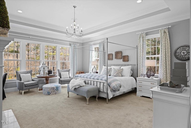 bedroom featuring ornamental molding, a raised ceiling, light colored carpet, and a chandelier