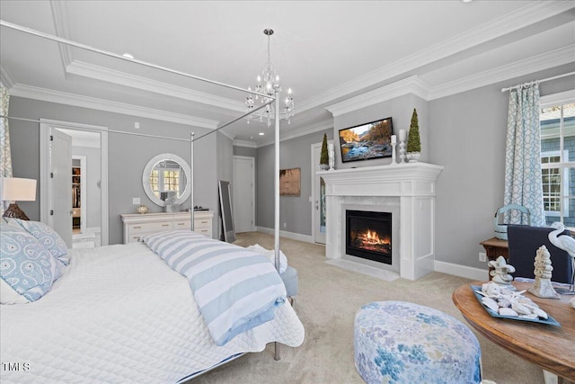 bedroom featuring light colored carpet, a fireplace, baseboards, an inviting chandelier, and crown molding