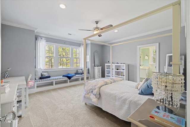 carpeted bedroom featuring recessed lighting, ensuite bath, visible vents, and crown molding