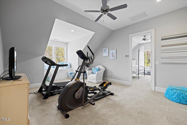 workout area with carpet, lofted ceiling, visible vents, a ceiling fan, and baseboards