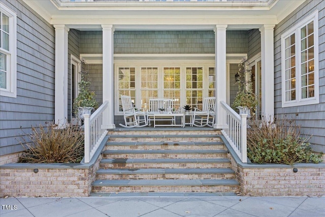 property entrance featuring covered porch