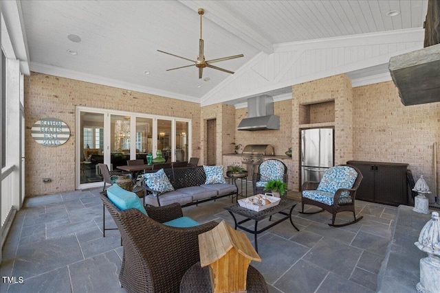 view of patio / terrace featuring ceiling fan, exterior kitchen, outdoor lounge area, and a grill