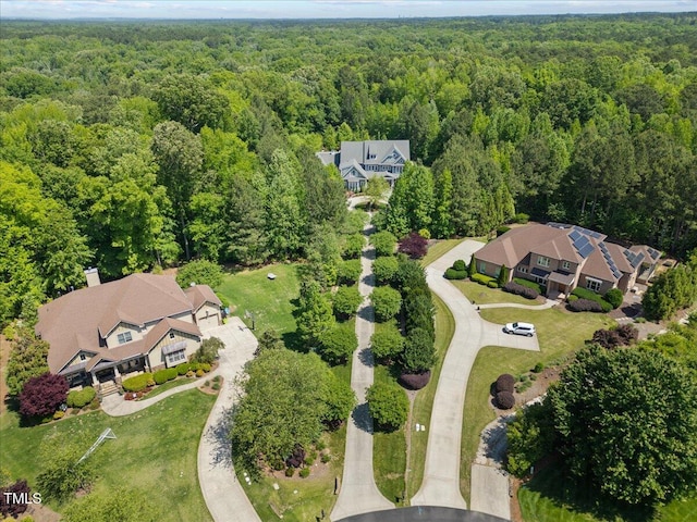 aerial view featuring a view of trees