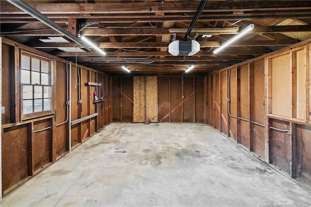 interior space featuring a garage and concrete flooring